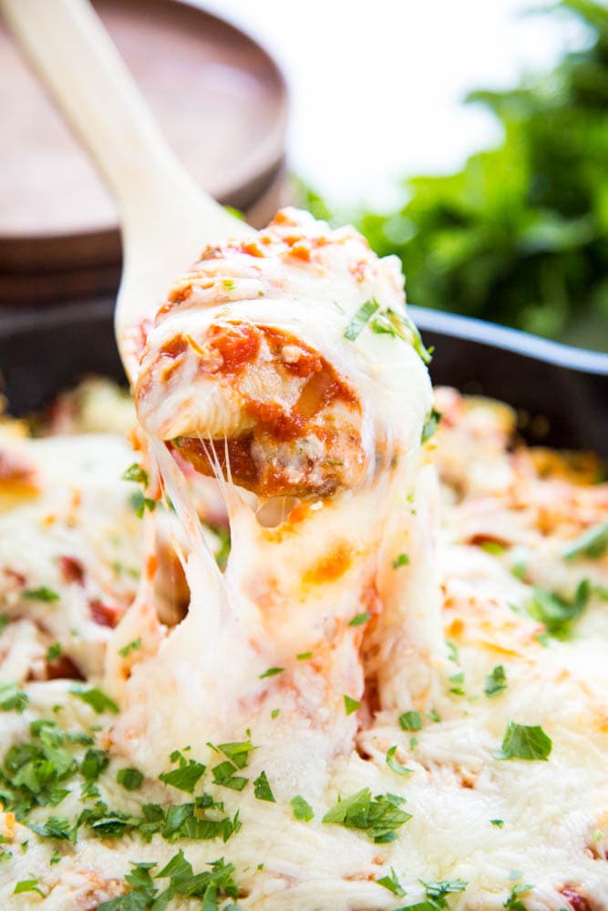 a stuffed shell on a spoon