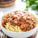a bowl of spaghetti with meat sauce