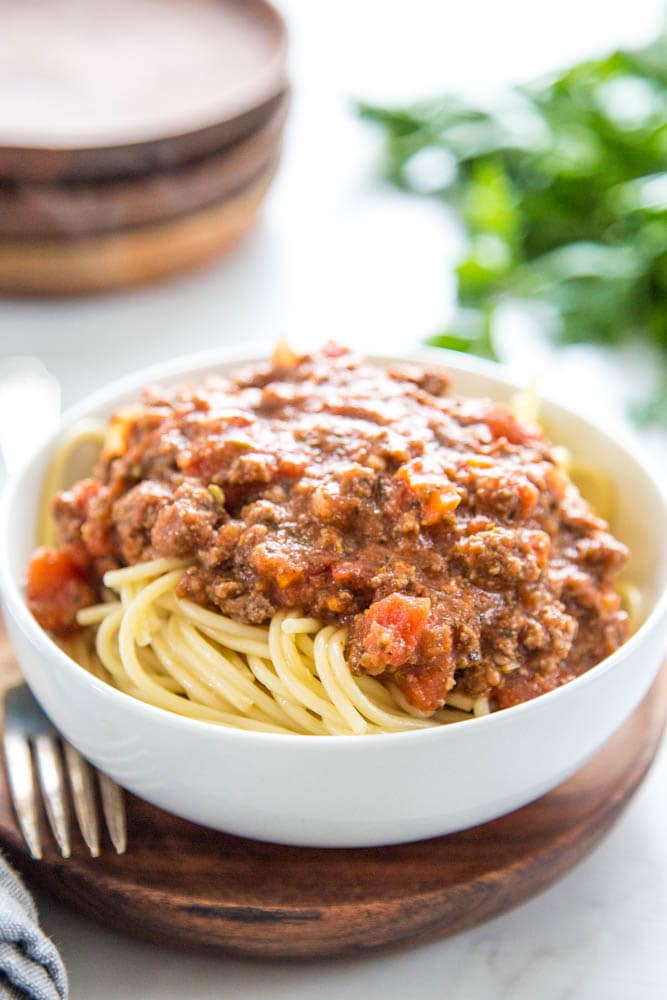 a bowl of spaghetti with meat sauce