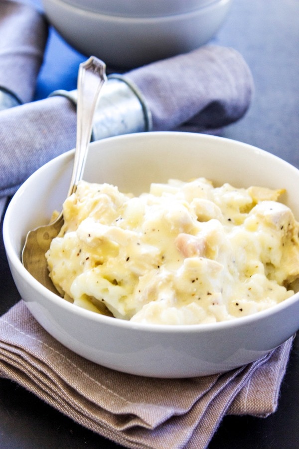 bowl of creamy chicken casserole over mashed potatoes