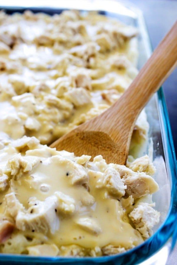 chicken casserole in pan with serving spoon