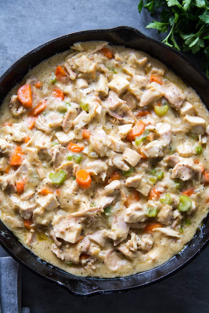chicken pot pie filling in a skillet