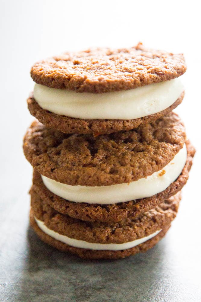 a stack of three carrot cake whoopie pies.