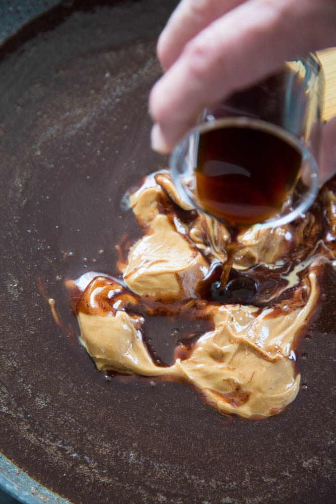 vanilla being poured into the pan.