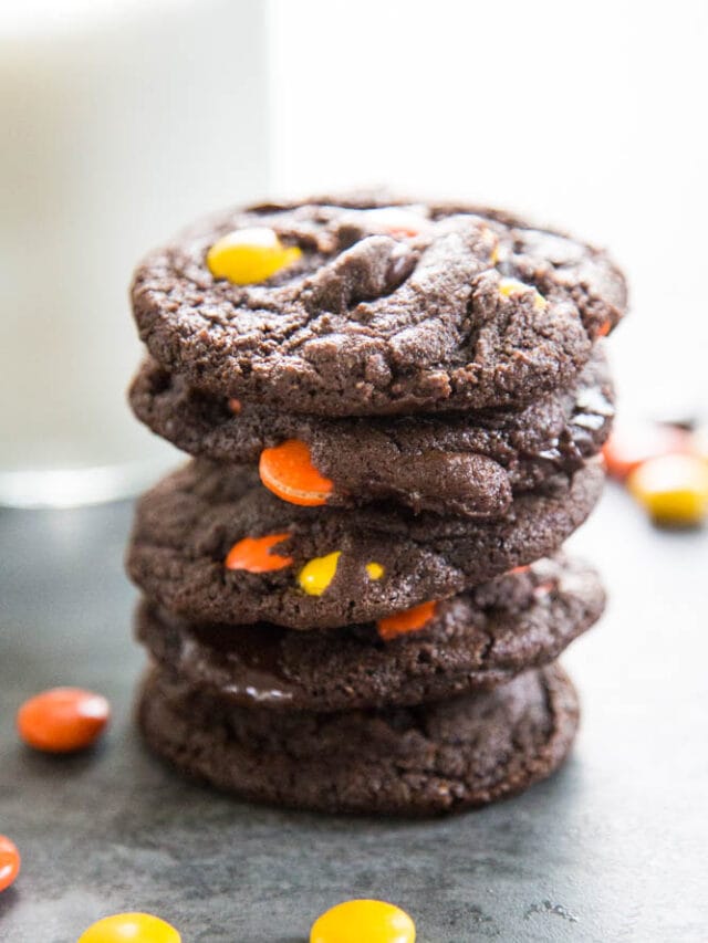 a stack of chocolate reese's cookies.
