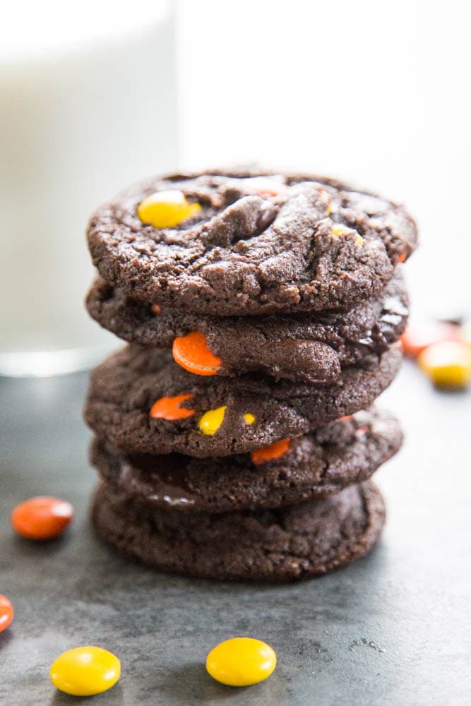 a stack of chocolate reese's cookies.