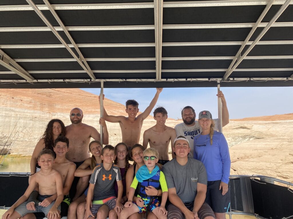 kids and adults on a houseboat at Lake Powell.