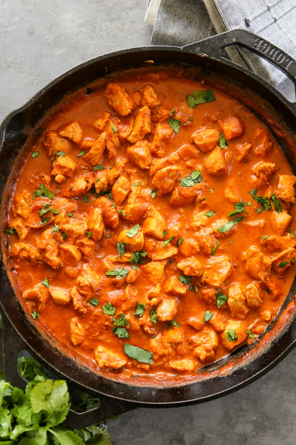 butter chicken in a skillet.