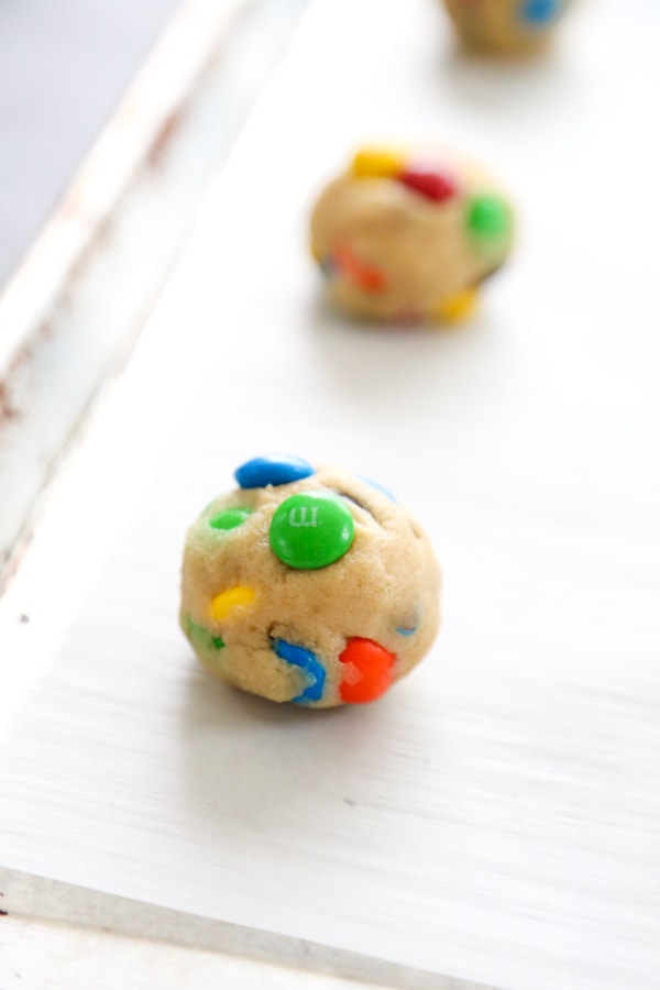 cookie dough ball on the baking sheet.