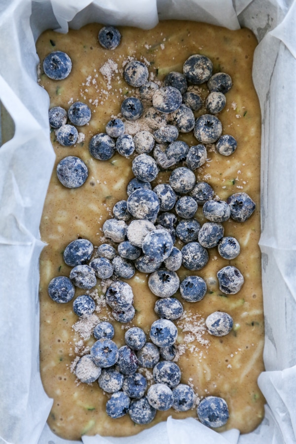 blueberries sprinkles over the top of the batter.