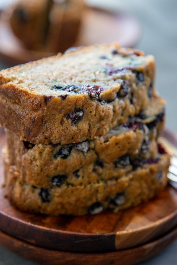 a stack of three slices of zucchini bread.