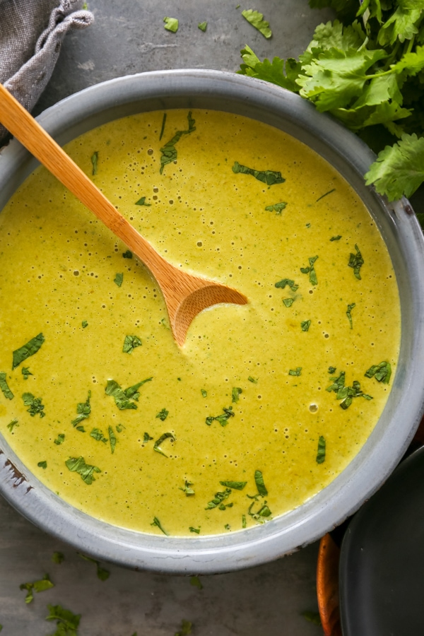 the sauce in a skillet with chopped cilantro.