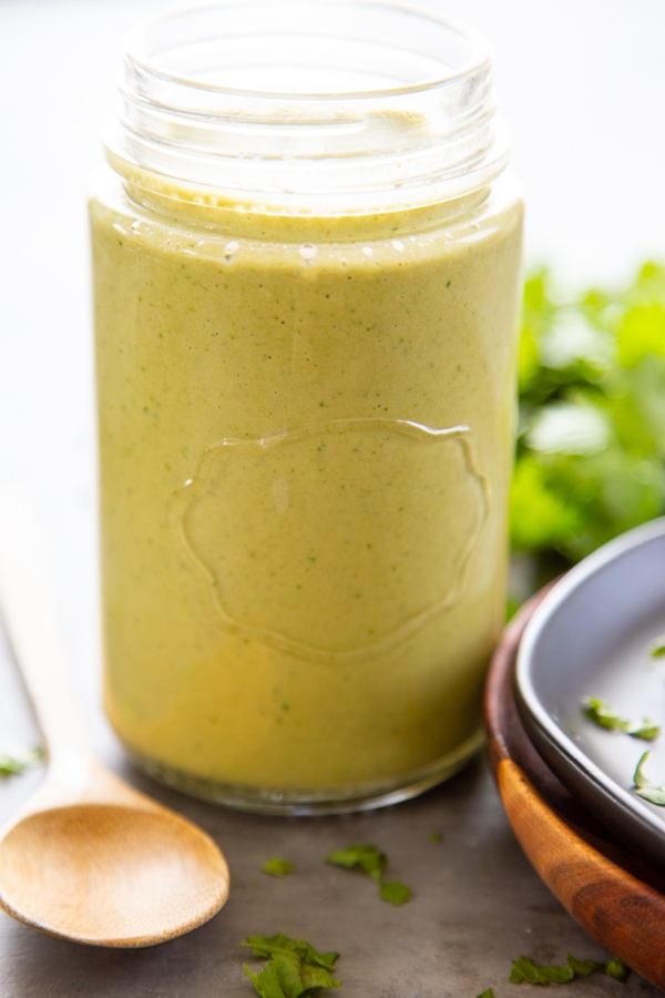 a jar of homemade green chile sauce.