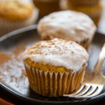 one glazed pumpkin zucchini muffin.