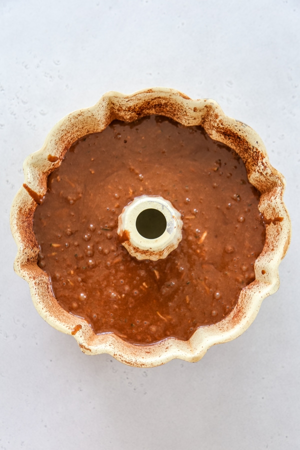 the batter in the cake pan.