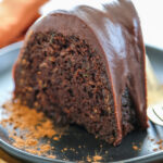 a slice of chocolate cake on a plate.