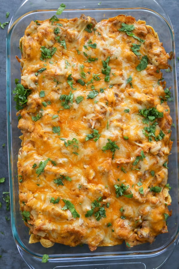 overhead photo of a baked chicken enchilada casserole.