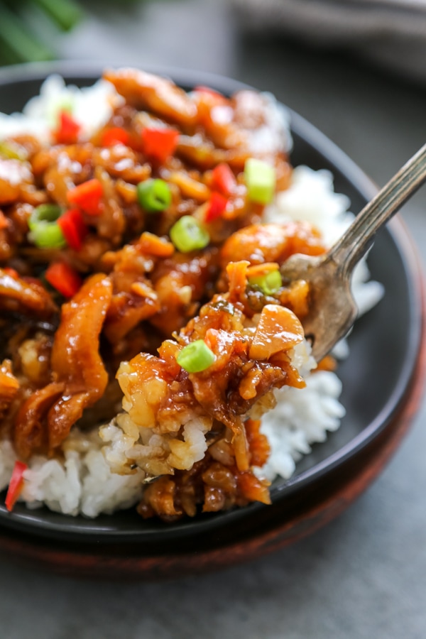 a forkful of Mongolian chicken.