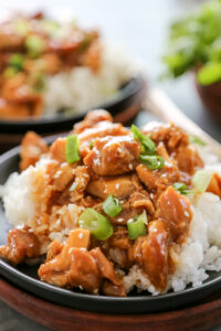 orange chicken on a plate.