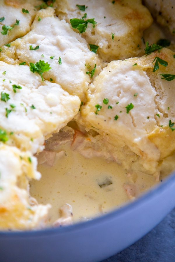 close-up of the pan of chicken and biscuits.