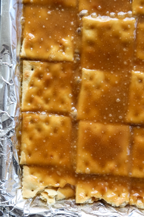 close-up shot of the bubbling toffee on the crackers.