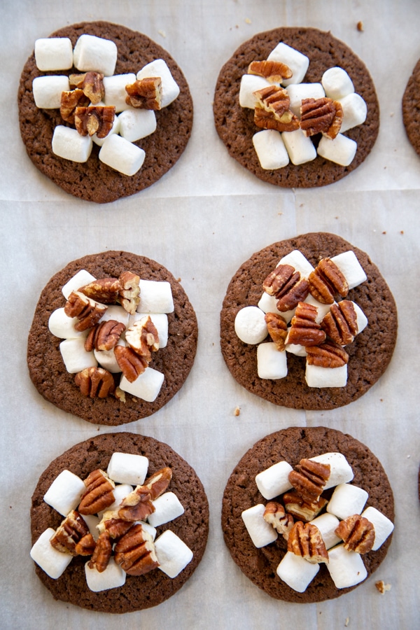 the cookies topped with marshmallows and pecans.