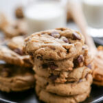 soft peanut butter chocolate chip cookies on a plate.