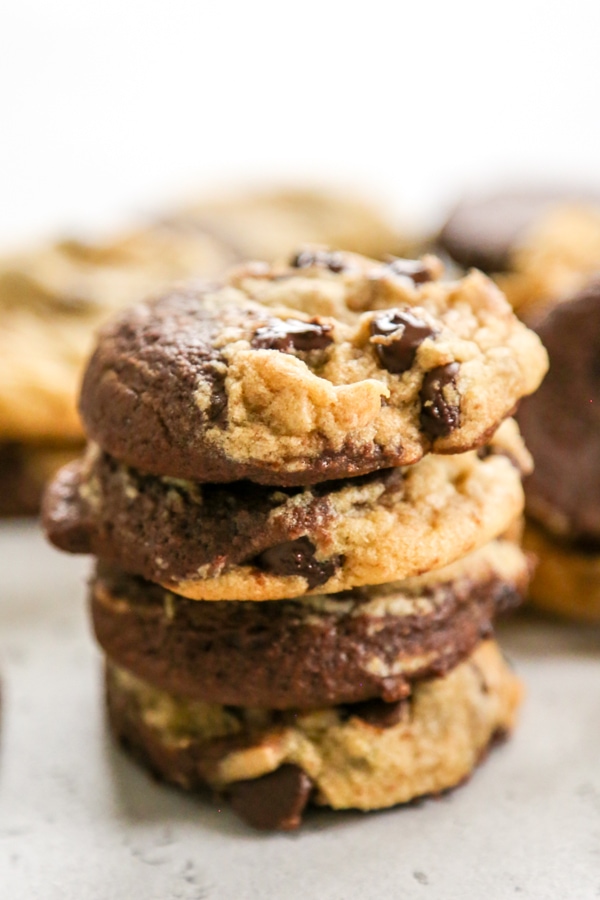 a stack of four brookies cookies.