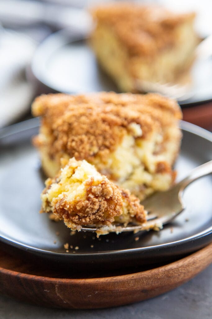 a bite of cake on a fork.