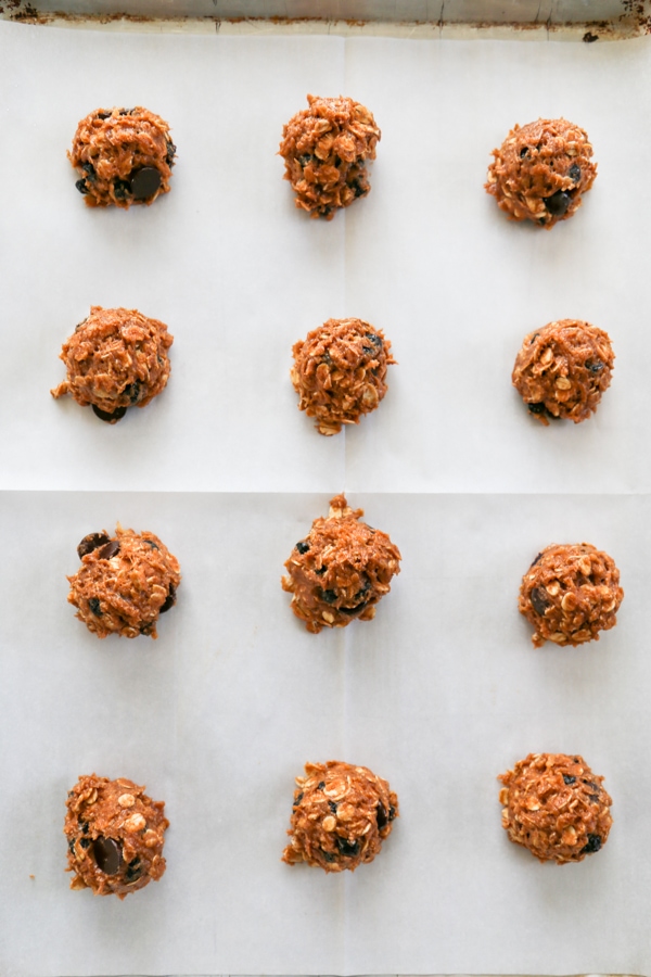 overhead shot of the cookies dough balls on a sheet pan.