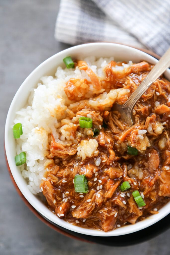 overhead shot of a bowl of chicken teriyaki with rice.