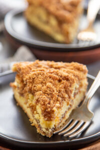 a slice of coffee cake on a plate.