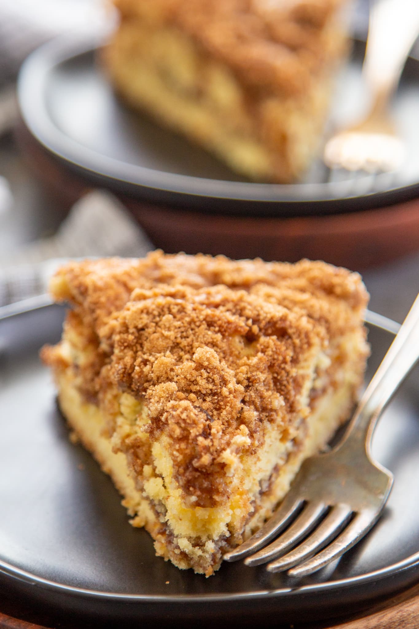 a slice of coffee cake on a plate.