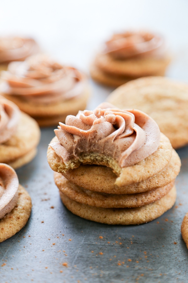 a stack of cookies with frosting.