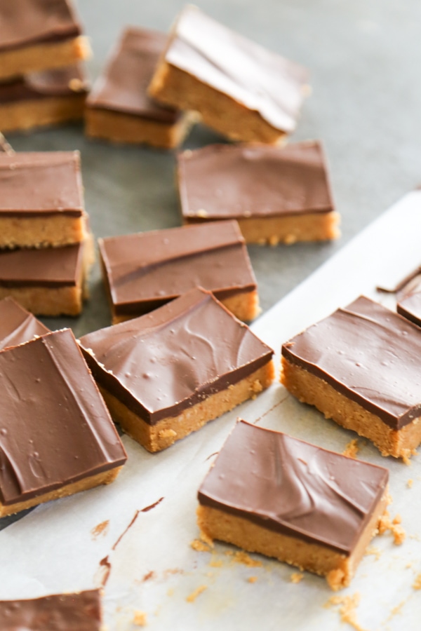 the sliced no bake bars on parchment paper.
