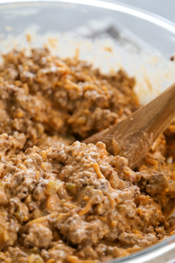 the beef and cheese added to the bowl.