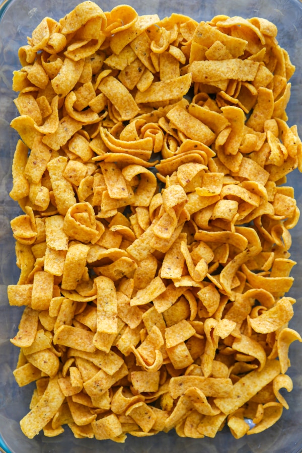 Fritos in a baking dish.