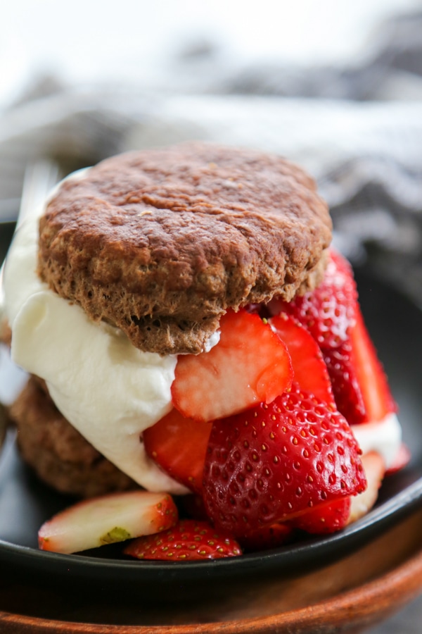 chocolate biscuit sandwiched with whipped cream and strawberries.