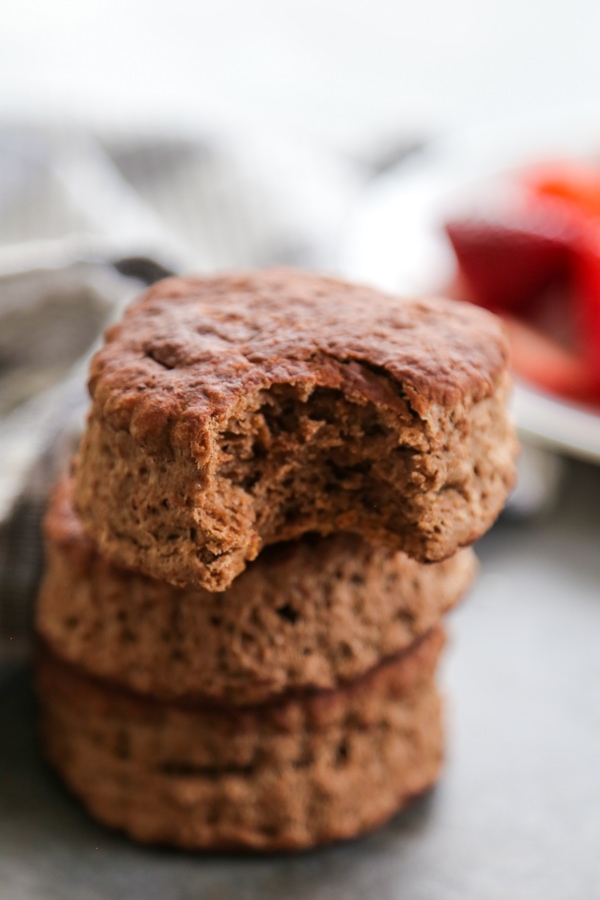 close-up shot of a chocolate biscuit with a bite taken out of it.