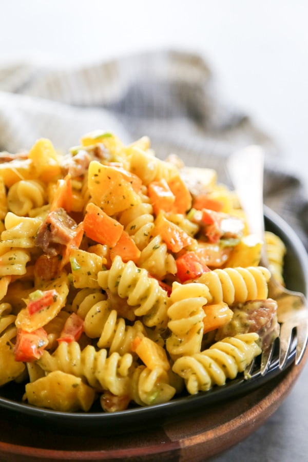 close up mango pasta salad on plate