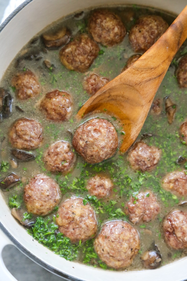 overhead shot of the meatballs simmering in the sauce.