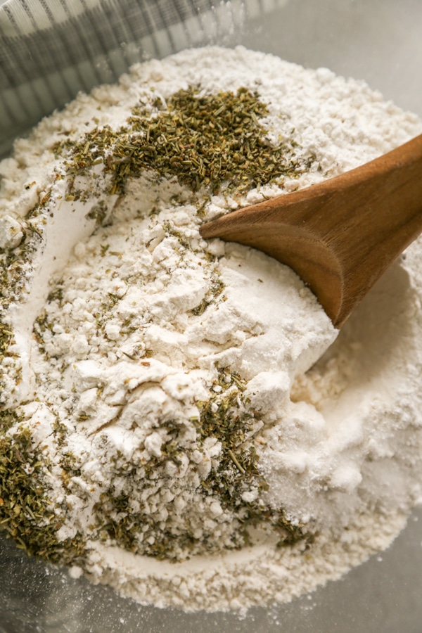 dry ingredients being mixed in a bowl.