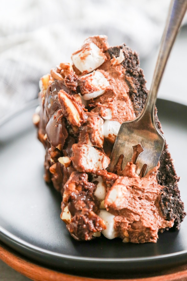 chocolate cheesecake with fudge, marshmallows and pecans