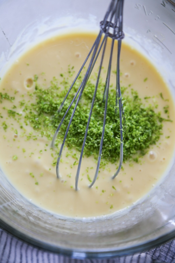 lime zest being mixed into the filling.