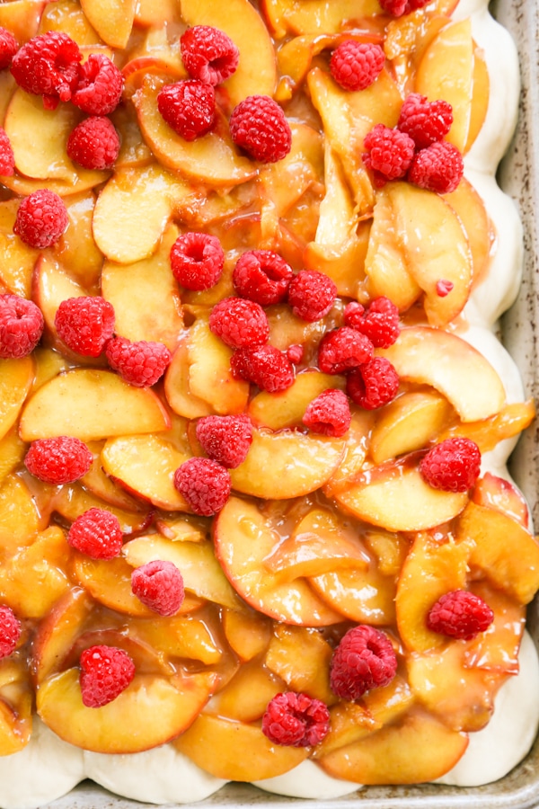 peaches and raspberries on the rolls.