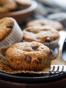 zucchini chocolate chip muffins on plate with fork