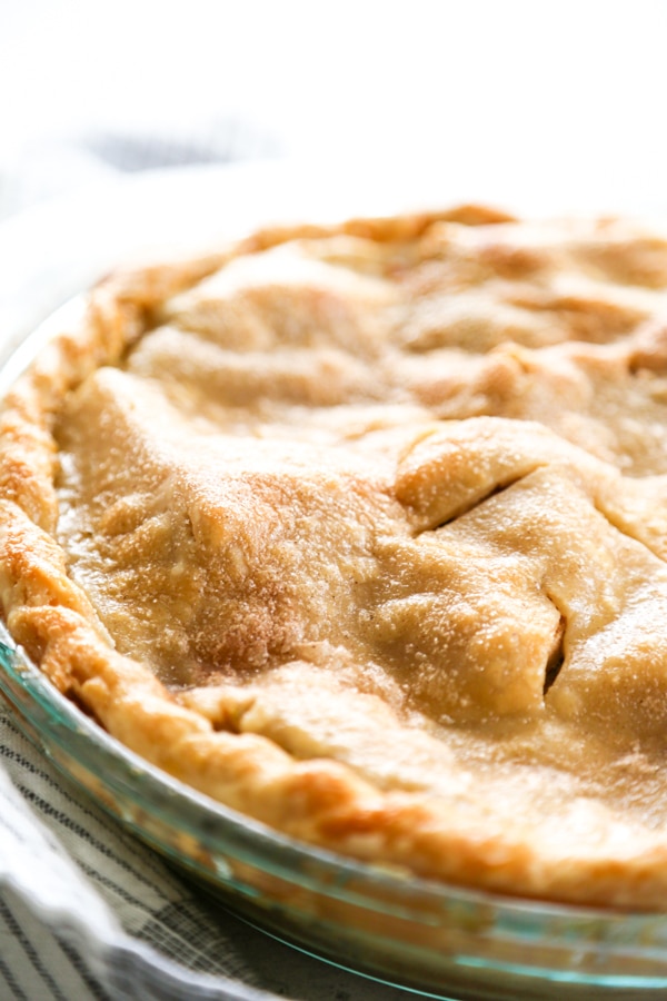 side shot of a full apple pie