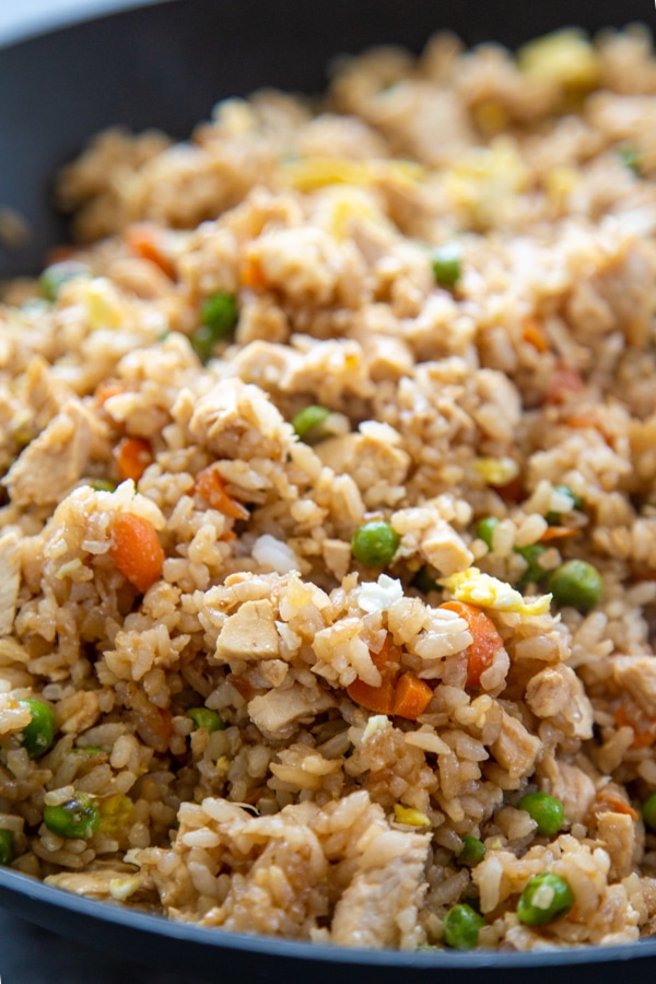 rice in skillet with vegetables