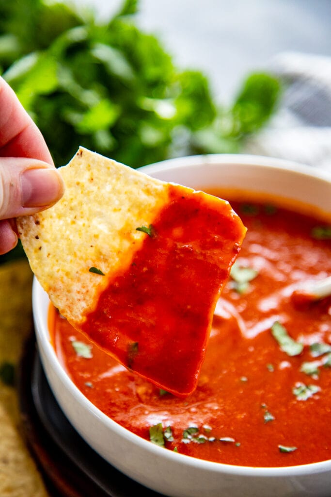 chip in red chile sauce