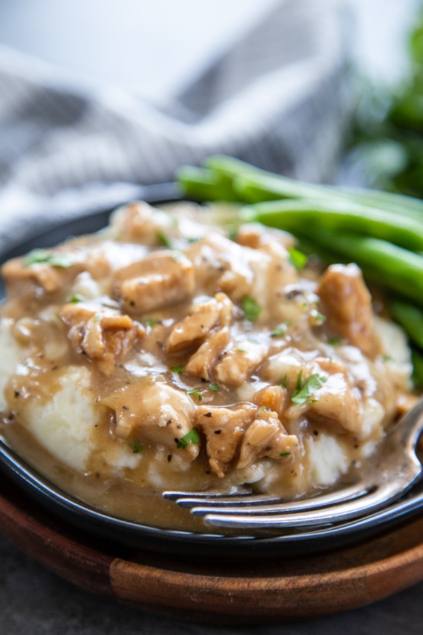 plate of mashed potatoes and chicken and french onion soup